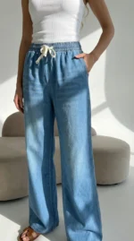 platūs džinsai moterims. melyni